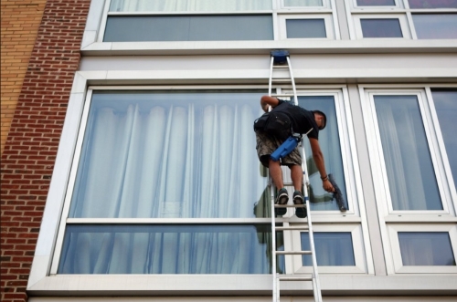 window cleaner on secure latter